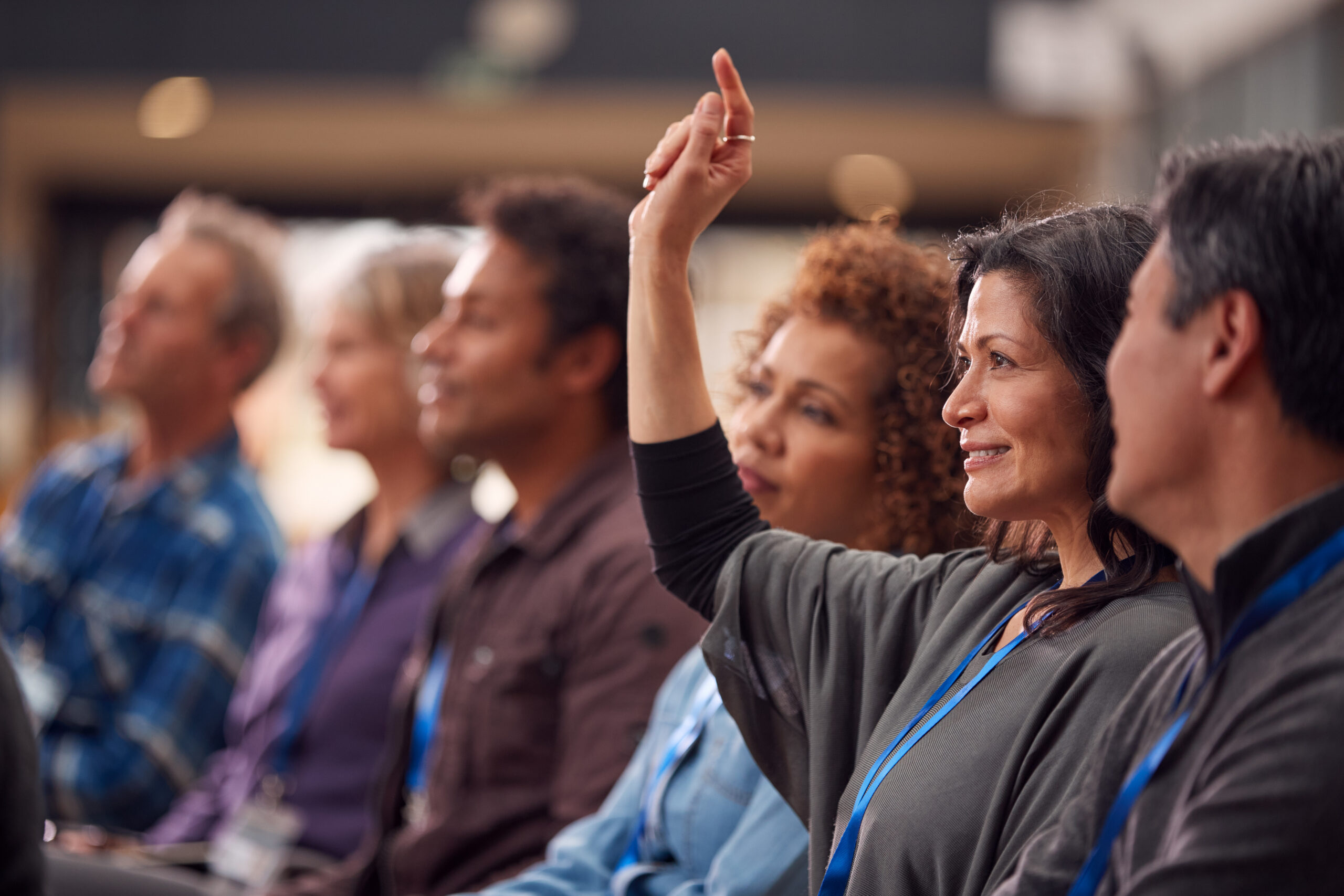 Professional asking a question during a workshop session